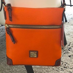 Dooney & Bourke Pebble leather crossbody bag in clementine orange.  Brand New.